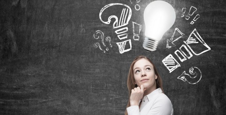 Young Woman Ponders About New Business Ideas. A Light Bulb As A