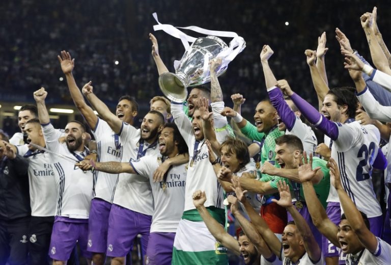Real Madrid's Sergio Ramos celebrates with the trophy after winning the UEFA Champions League Final